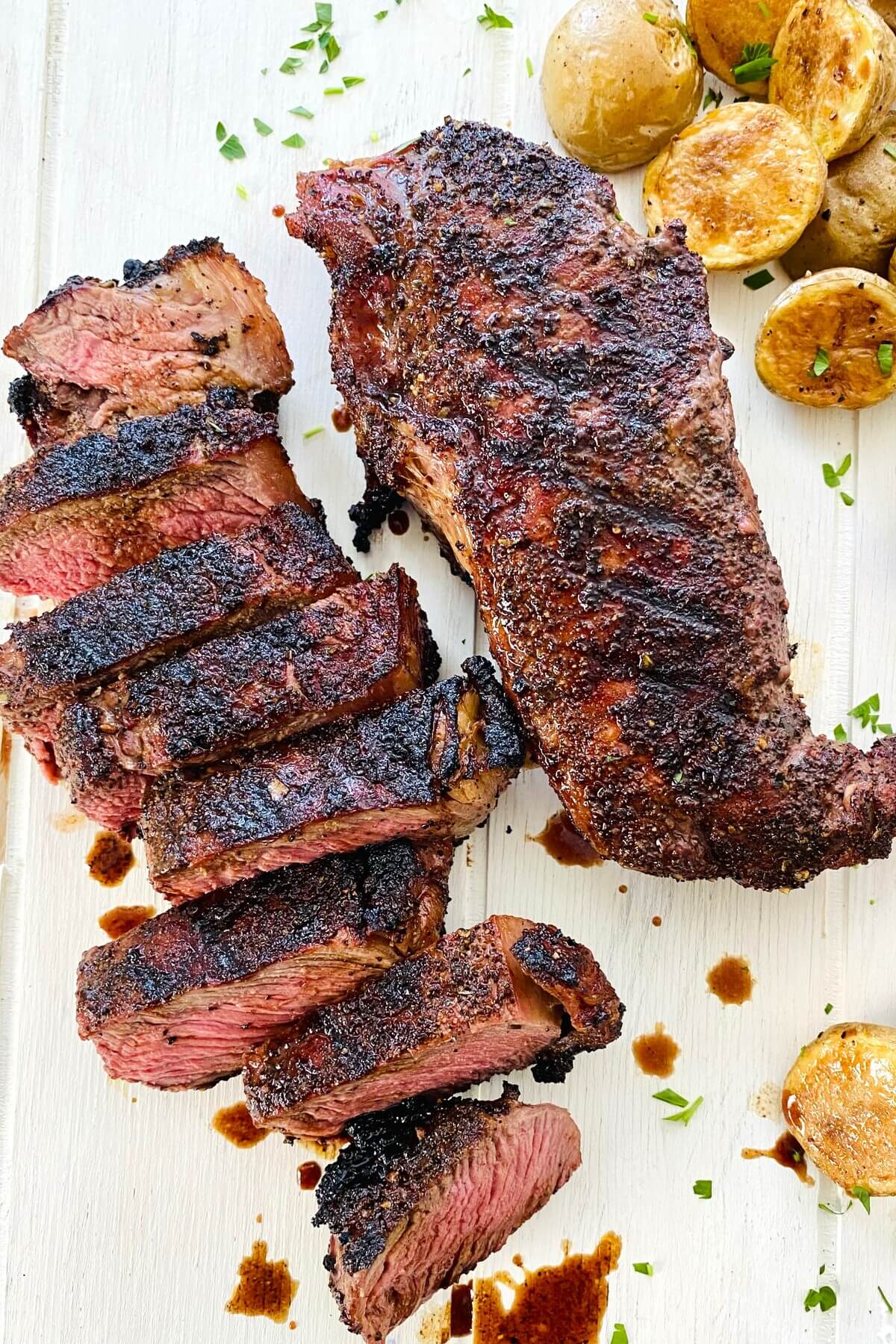 whole and sliced coffee rubbed steak recipe.