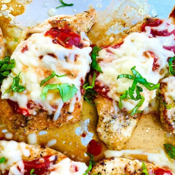 Low carb chicken parm on a baking sheet.