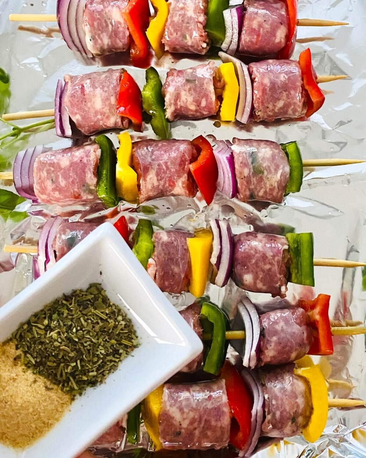 Sausage kabobs with Italian dried herbs.
