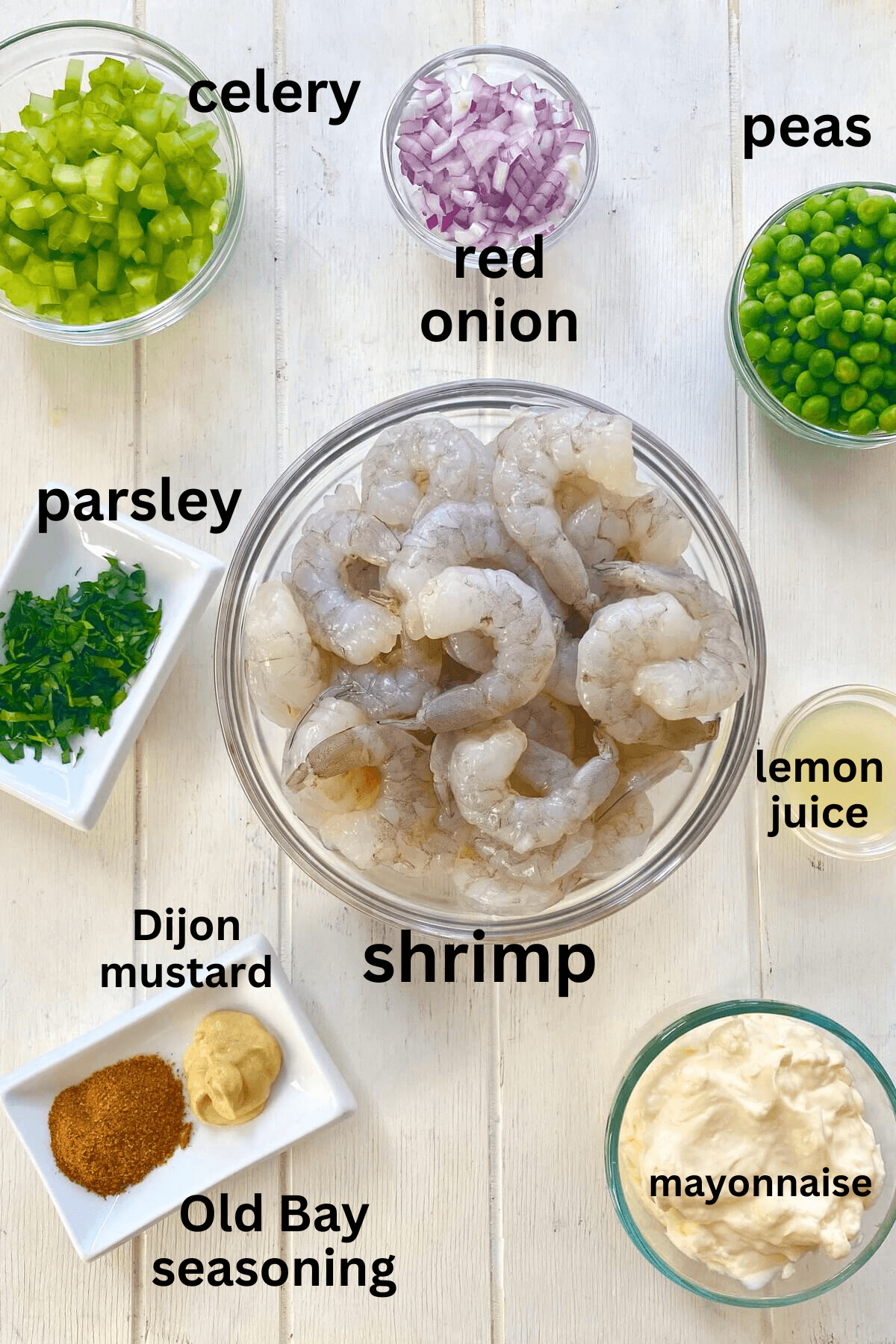 uncooked shrimp, celery, peas, mayo, onion, lemon juice, Old Bay, mustard.