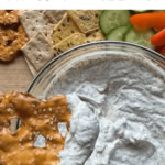 A pretzel covered in dip.