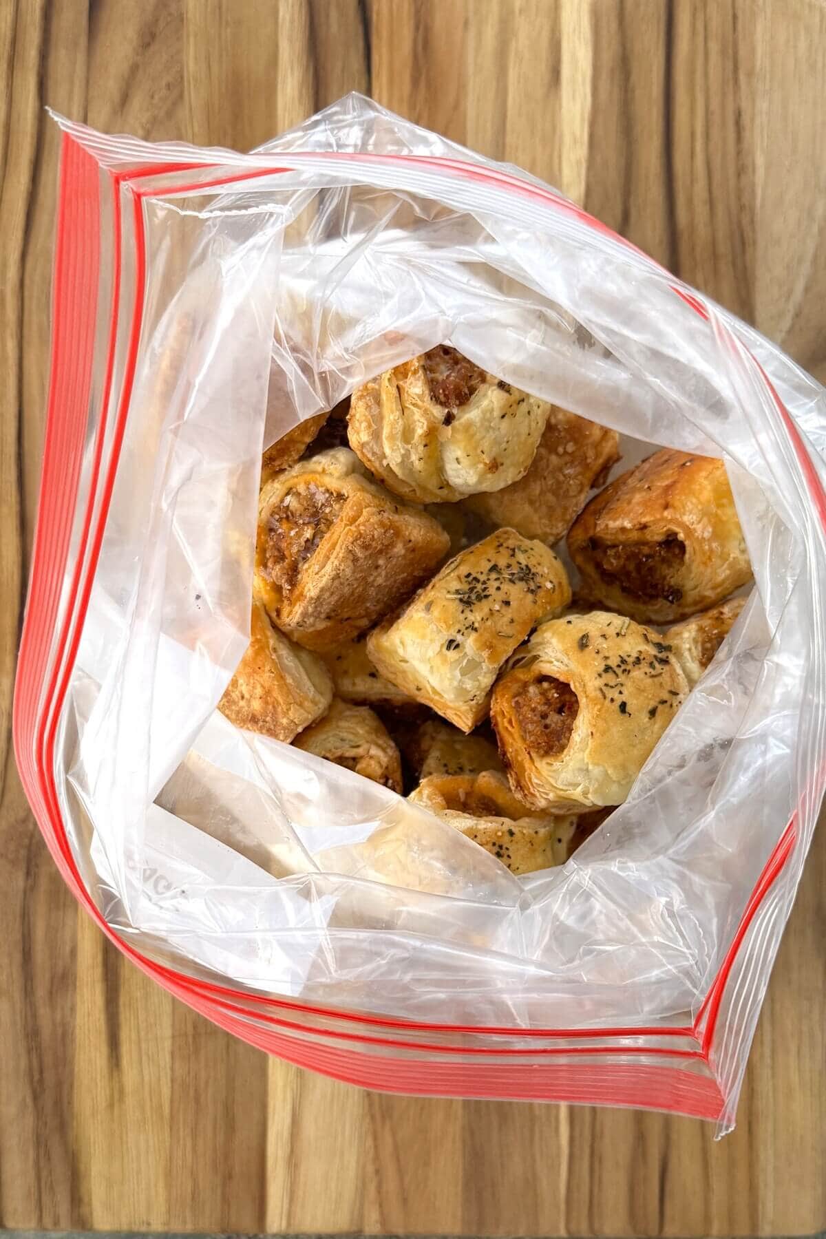 Frozen sausage rolls in a resealable bag.