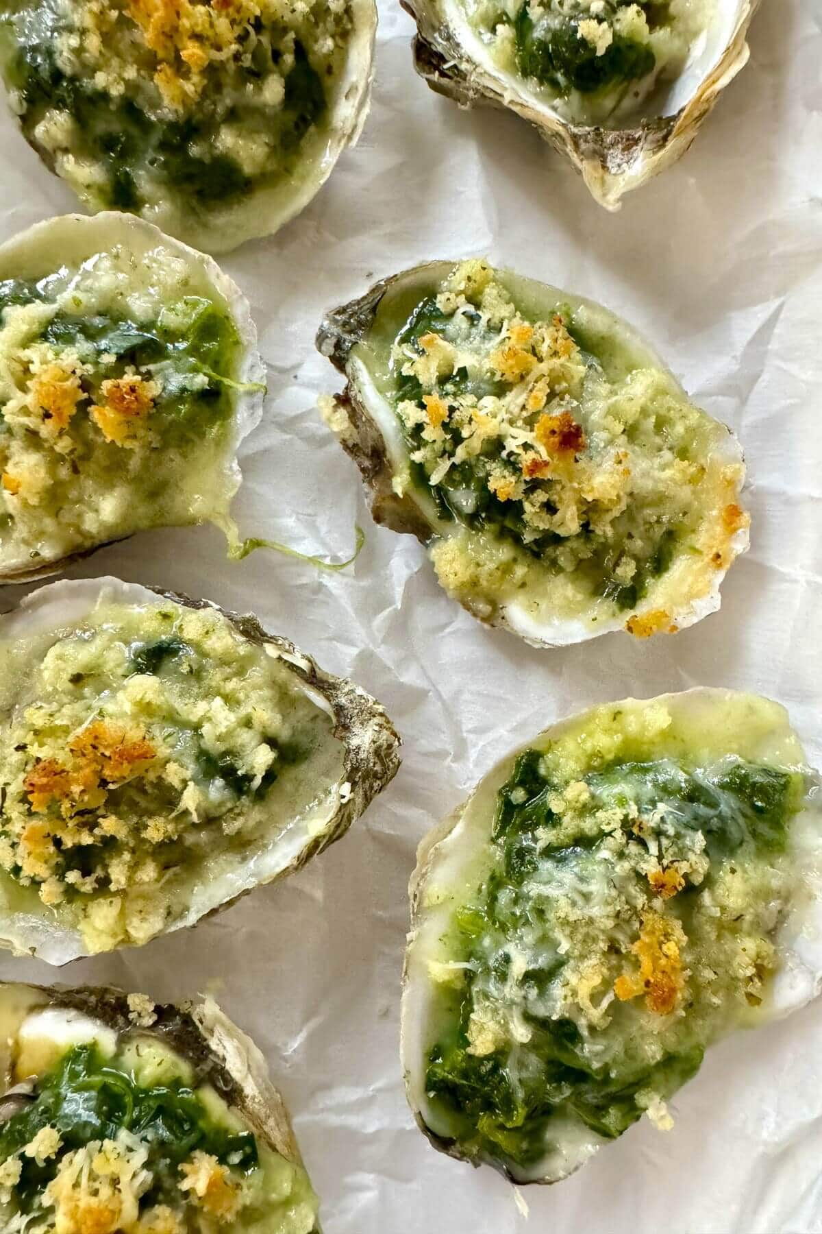 This simple Oysters Rockefeller recipe uses frozen creamed spinach making it easy to prepare, but no less impressive. It's a happy hour must!