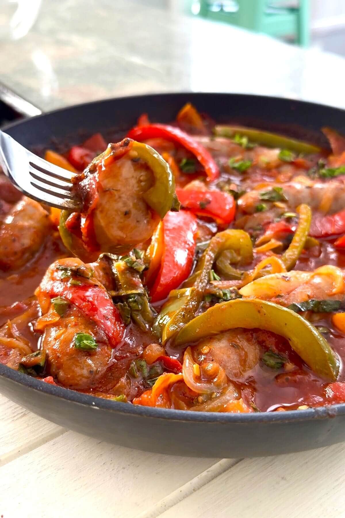 Italian sausage piece on a fork.