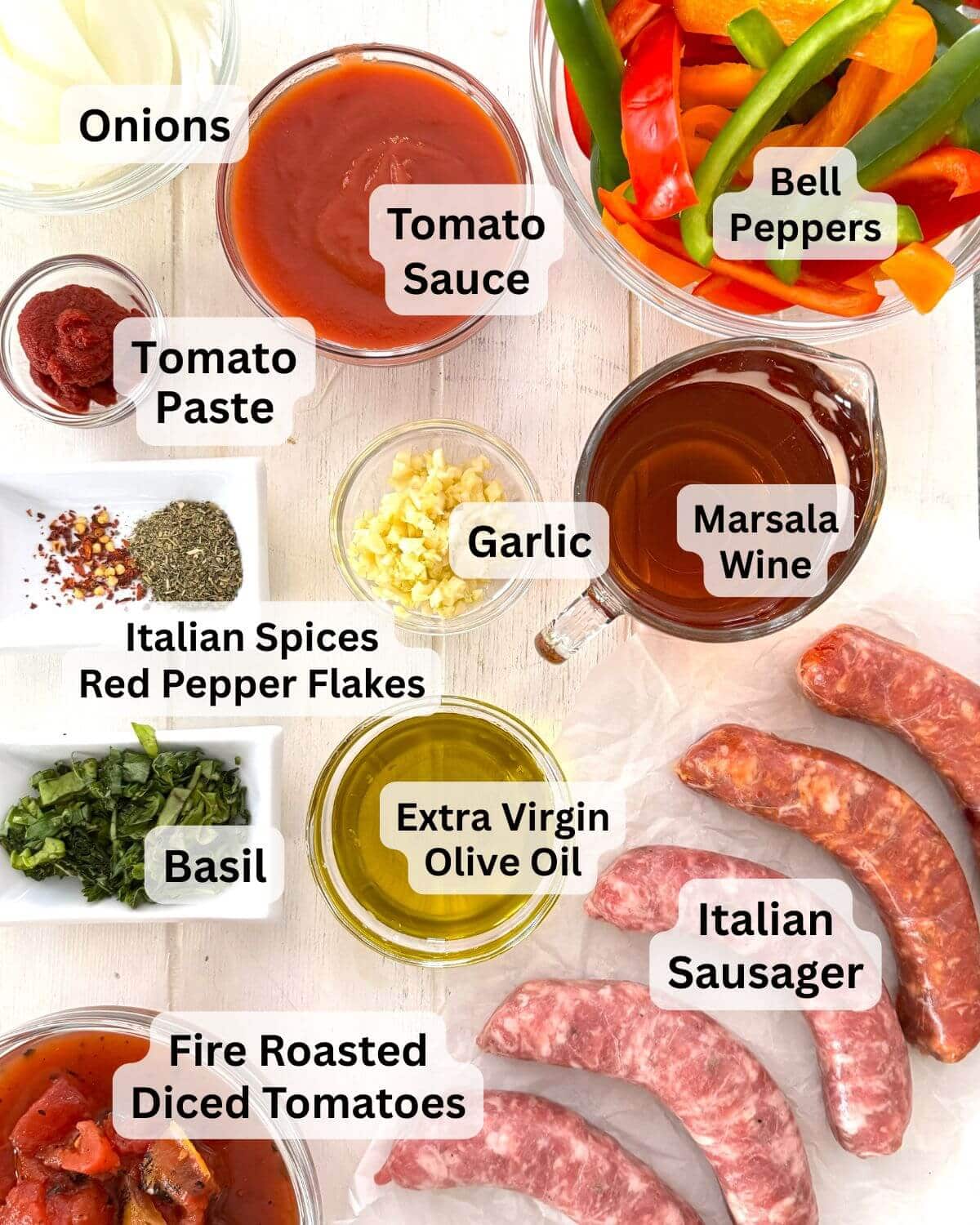 Italian sausage and peppers ingredients on a counter.